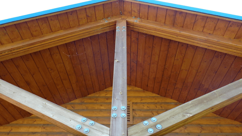 Why Do Gable Roofs Use Exposed Timber Supports?